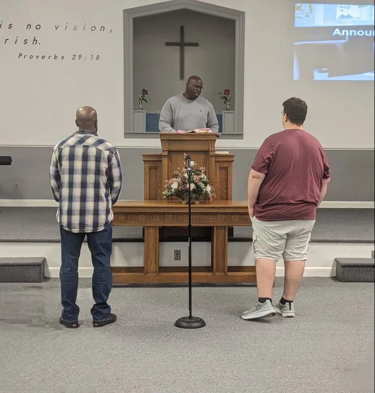 Members gathered for worship inside New Vision Ministries