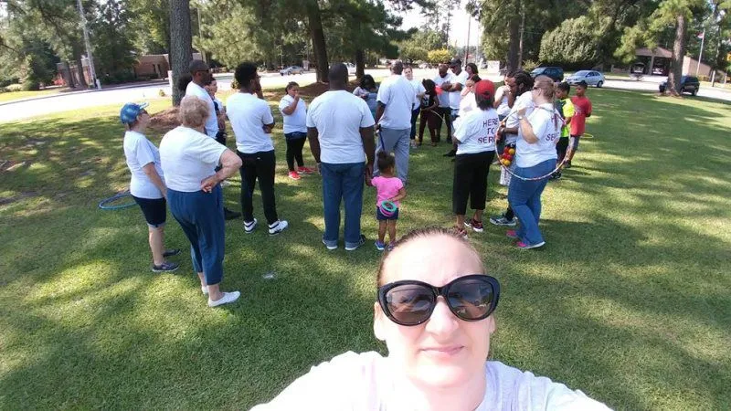 New Vision Ministries volunteers gathered for service