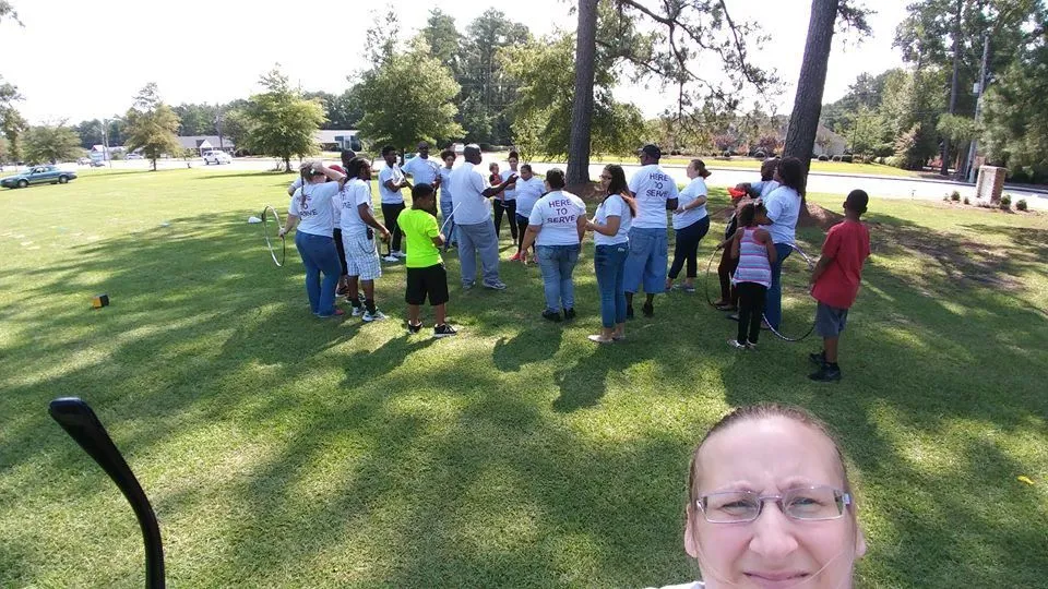 New Vision Ministries members serving together outdoors